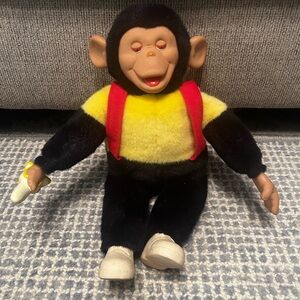 Vintage Monkey with banana, yellow and black.